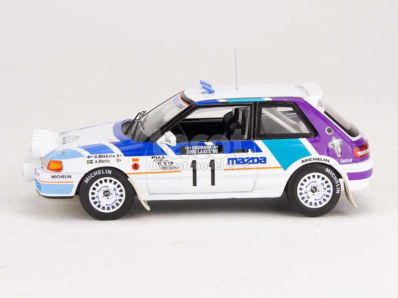 Voiture du Rallye des 1000 Lacs 1990 N°5 - MAZDA 323 GTX